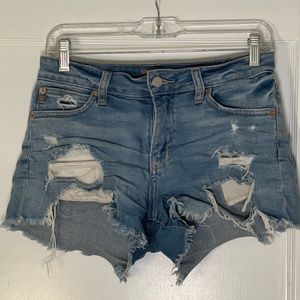 Distressed Mid Rise Denim Shorts